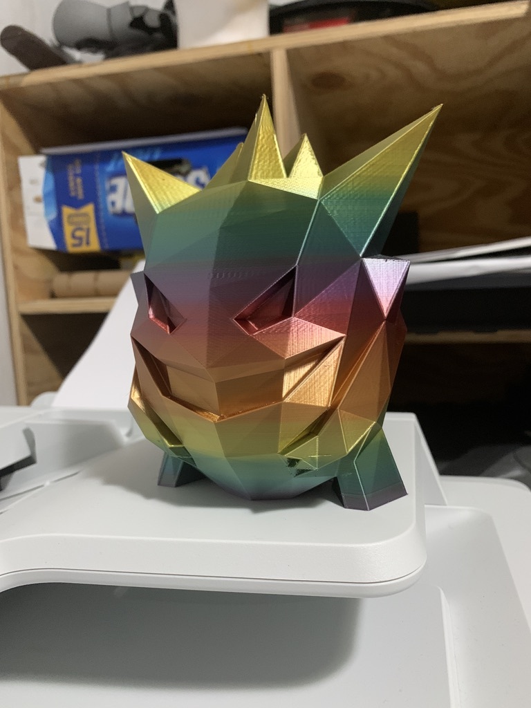 Made on 3D printer with rainbow filament.