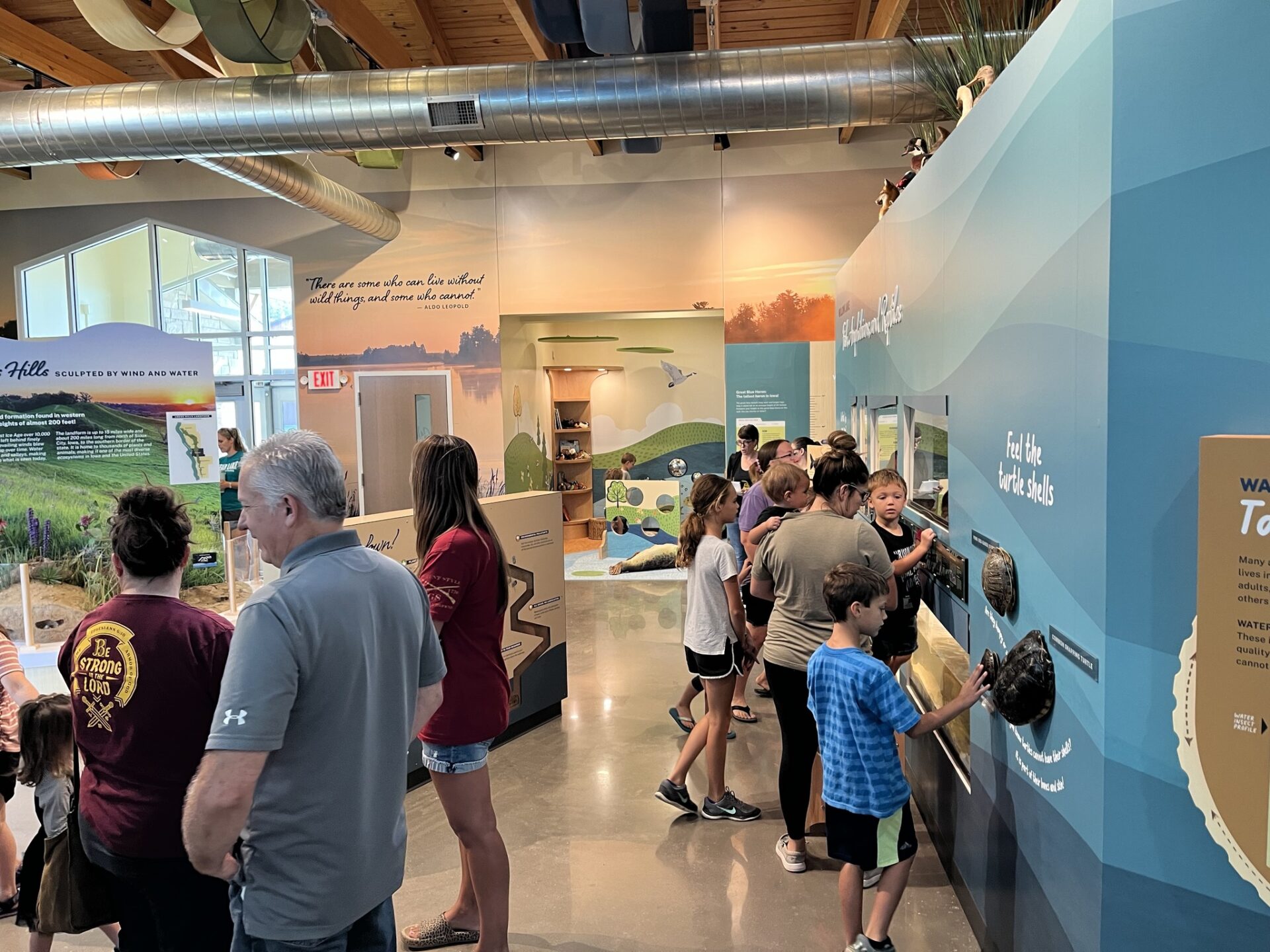 A large crowd experiences the completed Willow Lake Nature Center.
